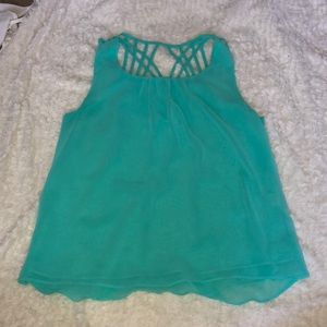 Teal flowy tank top. Size medium.